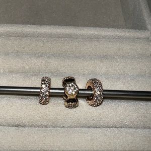 Pandora rose gold spacers.